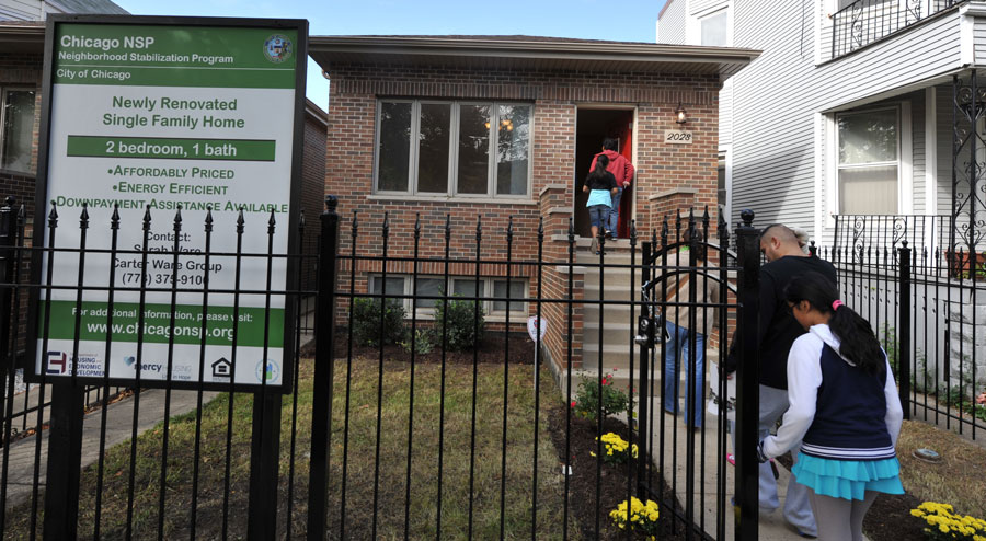 Latino family entering new home