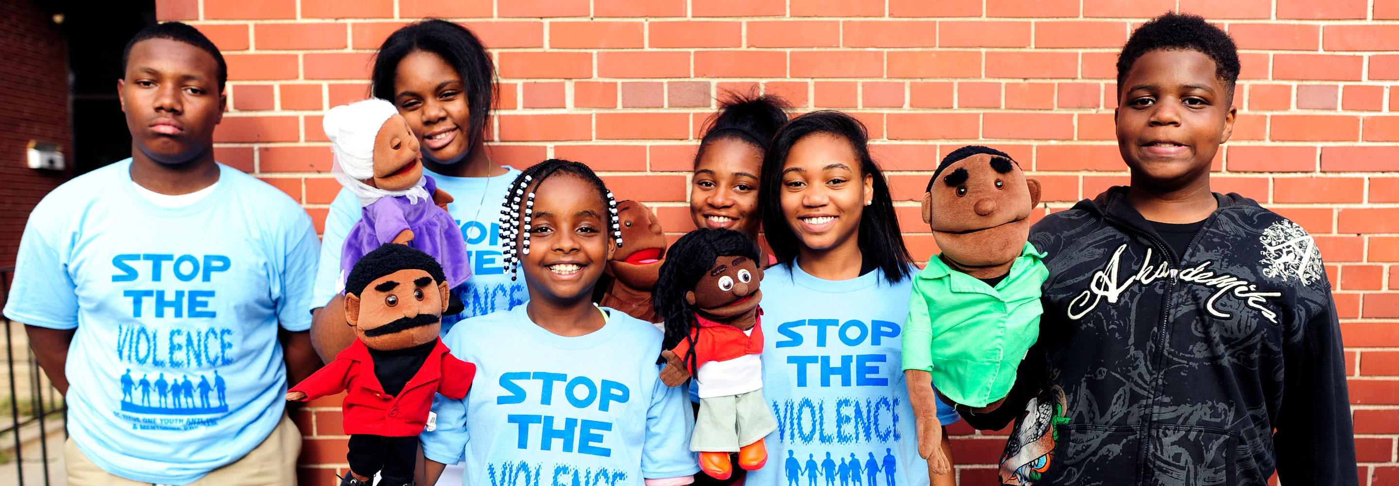 A group of children participating in a Stop The Violence Workshop.