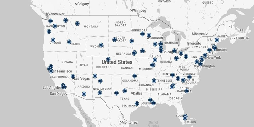 A map of the united states, dotted with blue markers, demonstrating the participants in the national Safety and Justice Challenge.