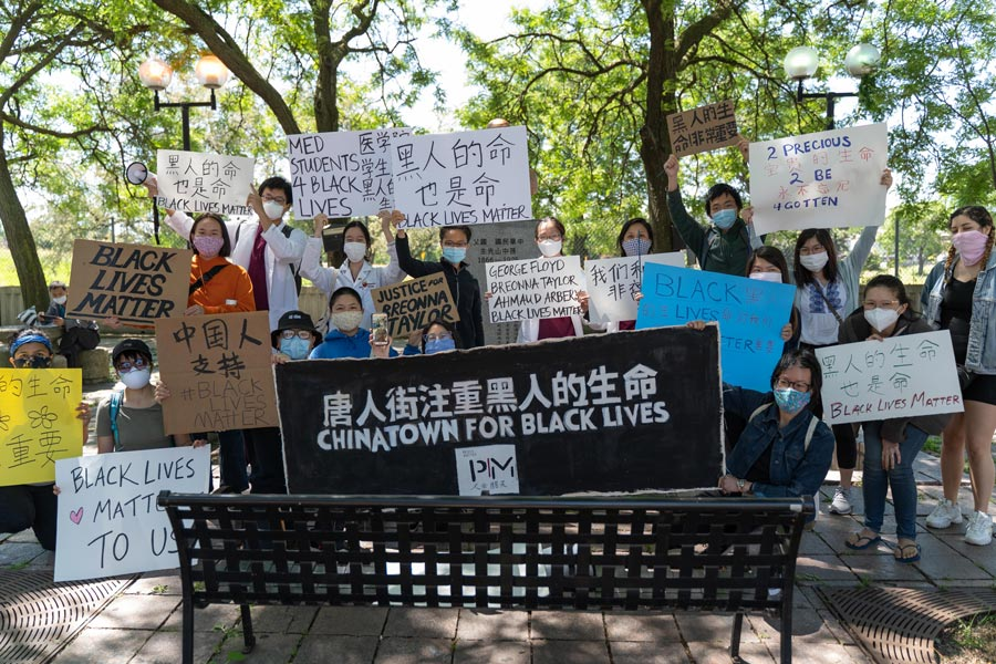 people holding signs