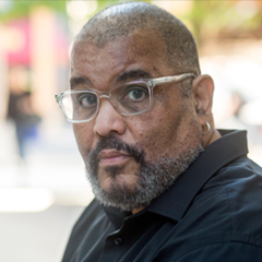 Profile portrait of Dawoud Bey