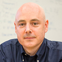 Profile portrait of Christopher Ré