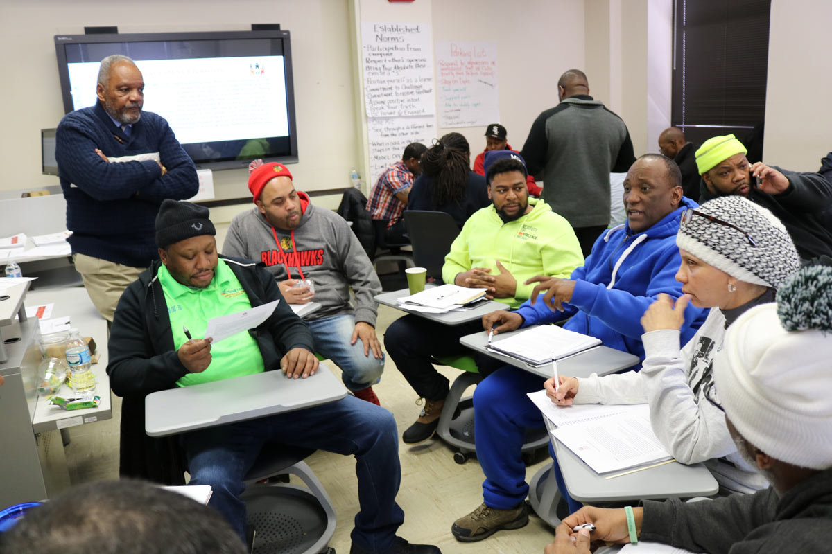 Black_Men_And_Women_Collaborating_Together_In_A_Classroom