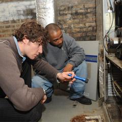 InspectorsLookingAtEnergySavingFurnace