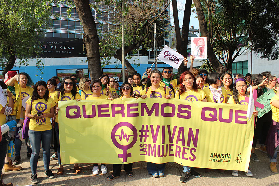 Group of Mexican people gather to protest violence against women in Mexico City