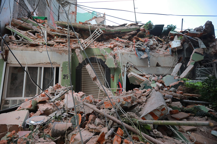Rubble_Collapsed_Around_Entrance_To_Home_After_Earthquake_In_Mexico_City