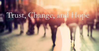 Trust,Hope,andChangebannerwithpeoplewalkinginbackground