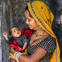 Young Indian mother with baby